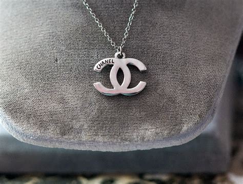 fake chanel symbol necklace|chanel necklace knockoffs.